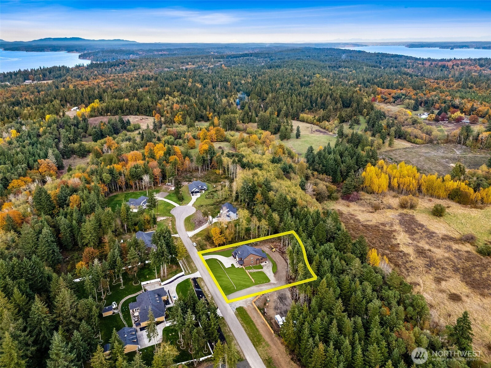 917 Tiedman Road Northwest Lakebay, WA 98349 - Photo 38 of 39 an aerial view of a house with a yard