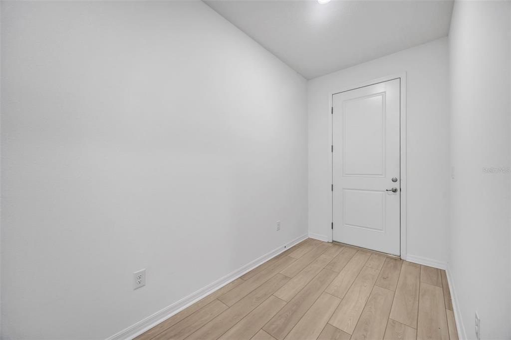 7882 Lennox Loop Wesley Chapel, FL 33544 - Photo 26 of 58 a view of an empty room