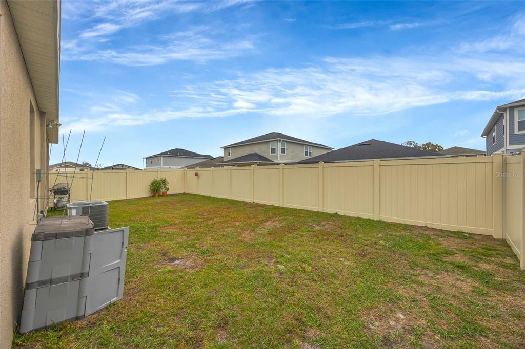 7882 Lennox Loop Wesley Chapel, FL 33544 - Photo 54 of 58 a view of an ocean & house