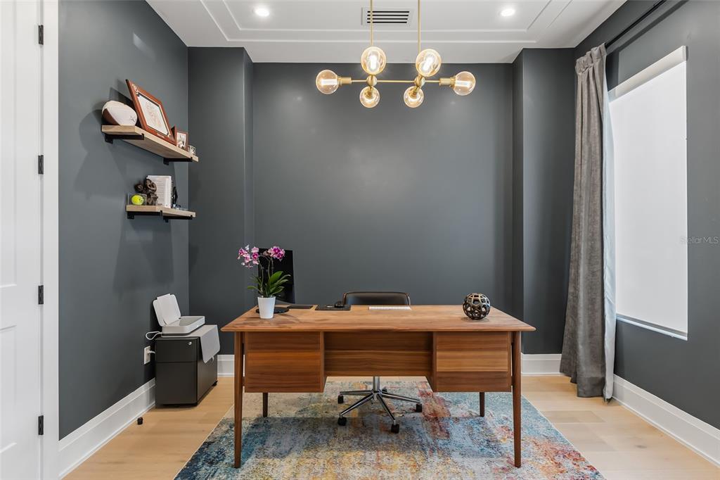 3316 Helen Avenue Orlando, FL 32804 - Photo 51 of 57 a room with a table chairs and chandelier