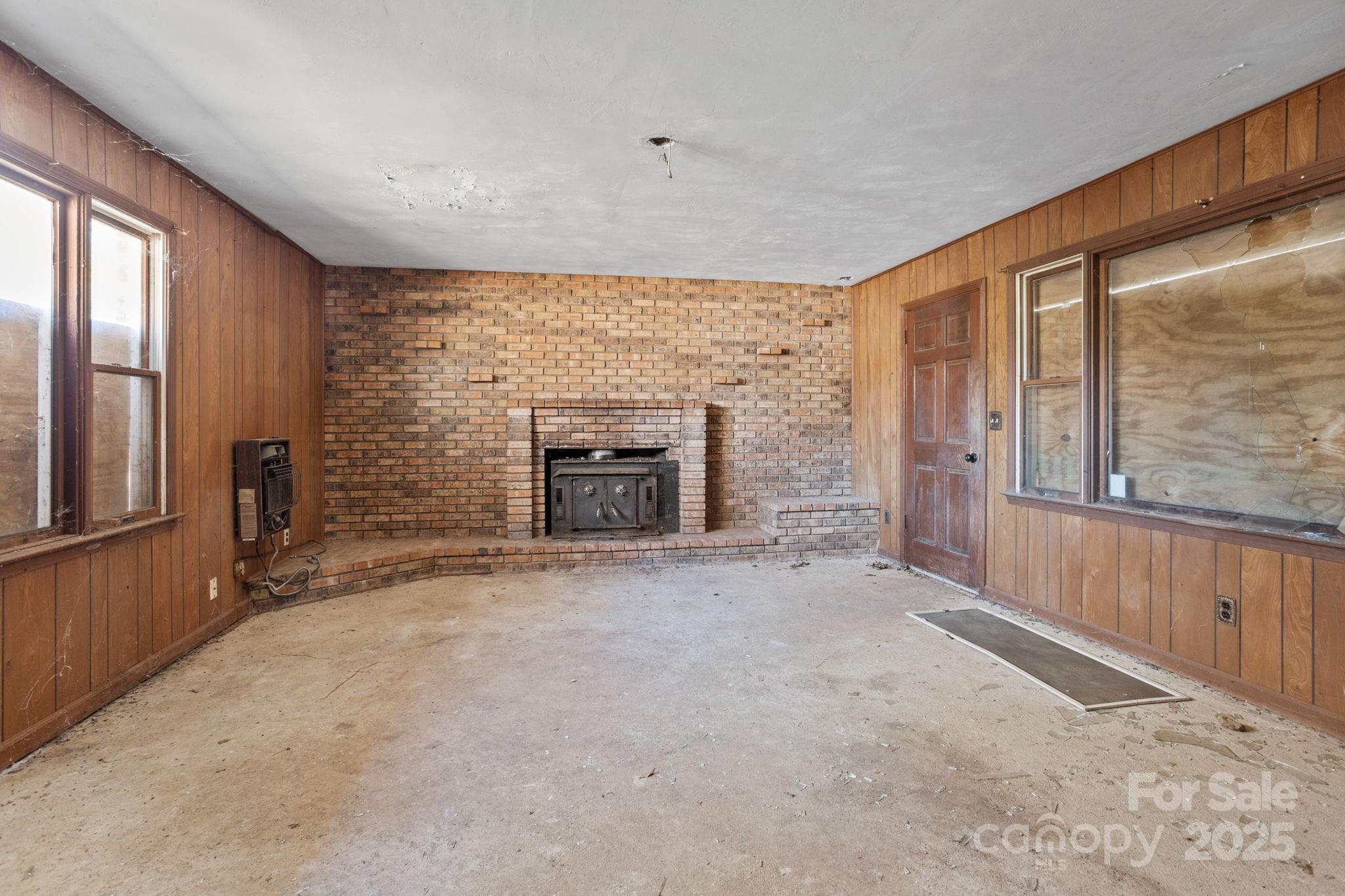 601 East Blue Ridge Road East Flat Rock, NC 28726 - Photo 9 of 48 an empty room with windows