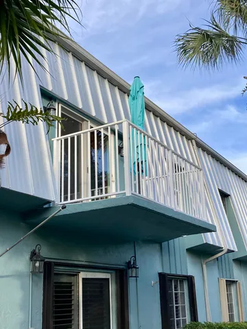 a balcony view with an outdoor space