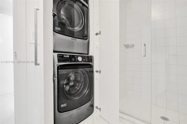 a utility room with dryer and washer