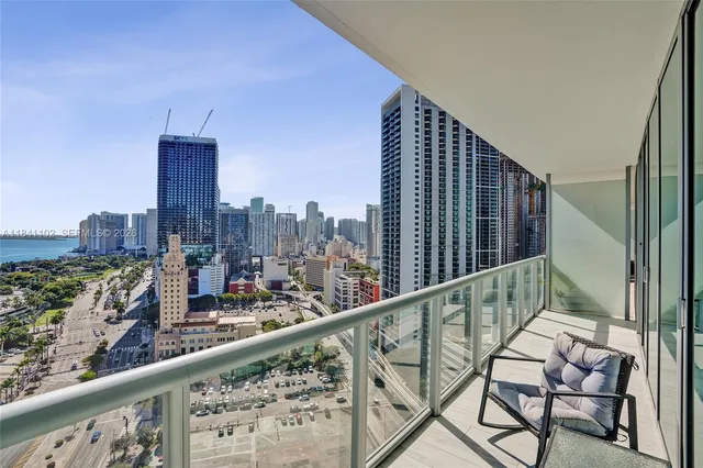 a view of balcony with furniture