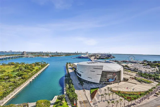 an aerial view of a house with a ocean view