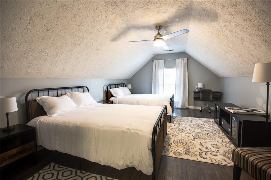 7151 Springchase Way Austell, GA 30168 - Photo 11 of 14 a bedroom with bed and window