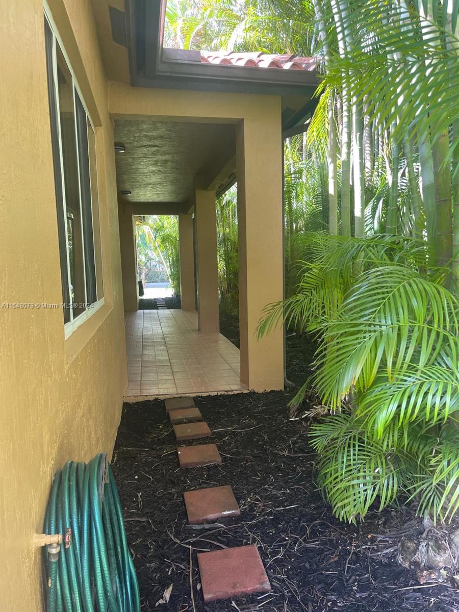 32050 Southwest 204th Avenue Homestead, FL 33030 - Photo 30 of 36 a view of outdoor space and garden