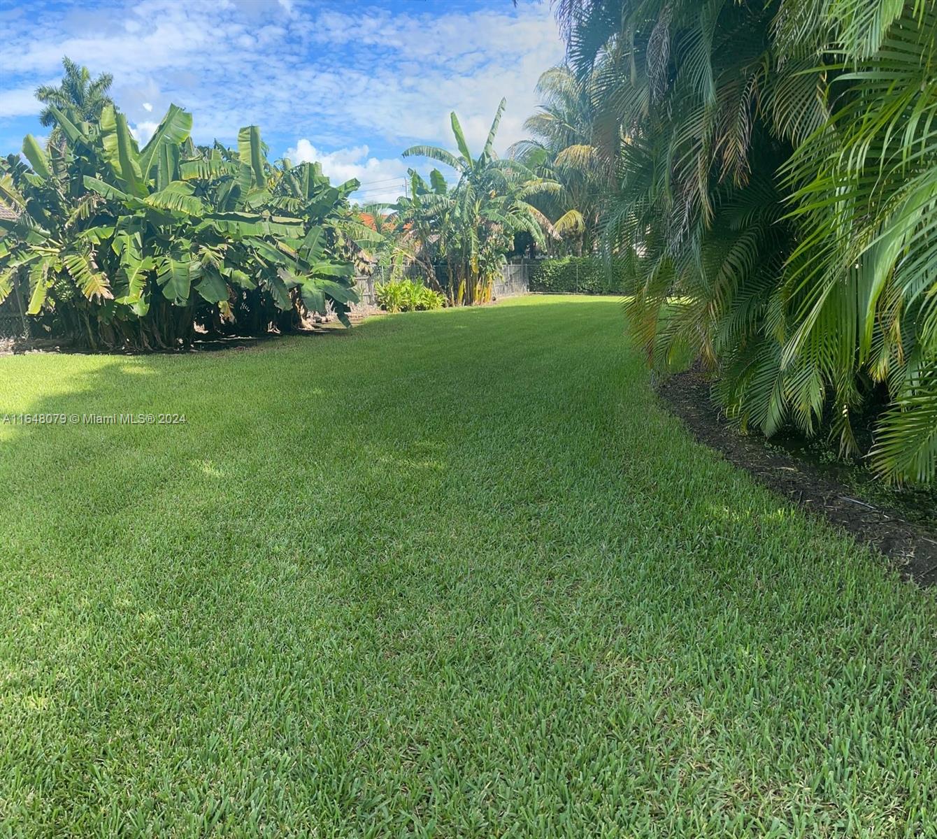 32050 Southwest 204th Avenue Homestead, FL 33030 - Photo 32 of 36 a view of a garden