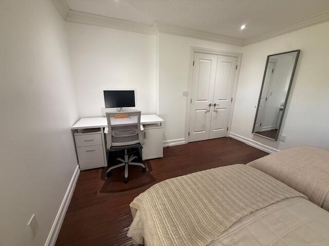 8458 Boca Glades Boulevard East Boca Raton, FL 33434 - Photo 12 of 28 a bedroom with a bed and a desk