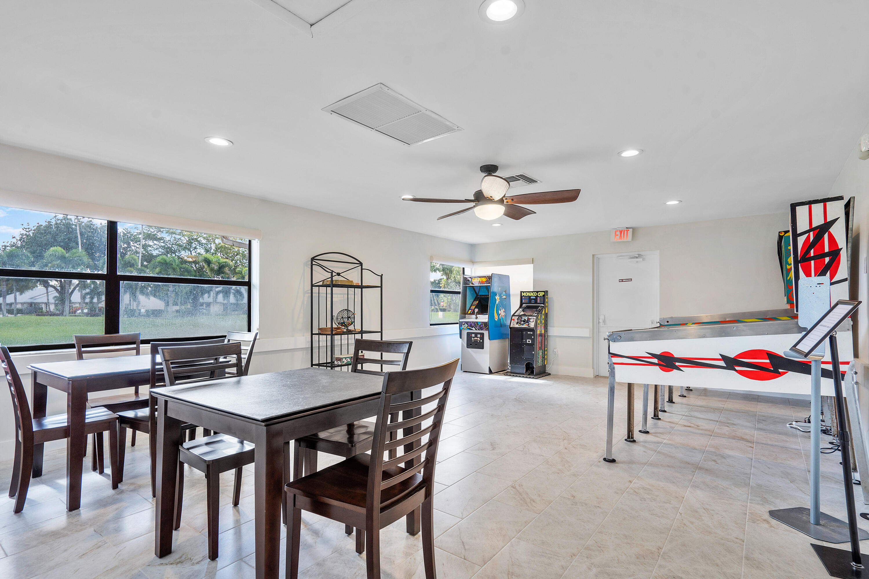 8458 Boca Glades Boulevard East Boca Raton, FL 33434 - Photo 19 of 28 a dining room with furniture and window