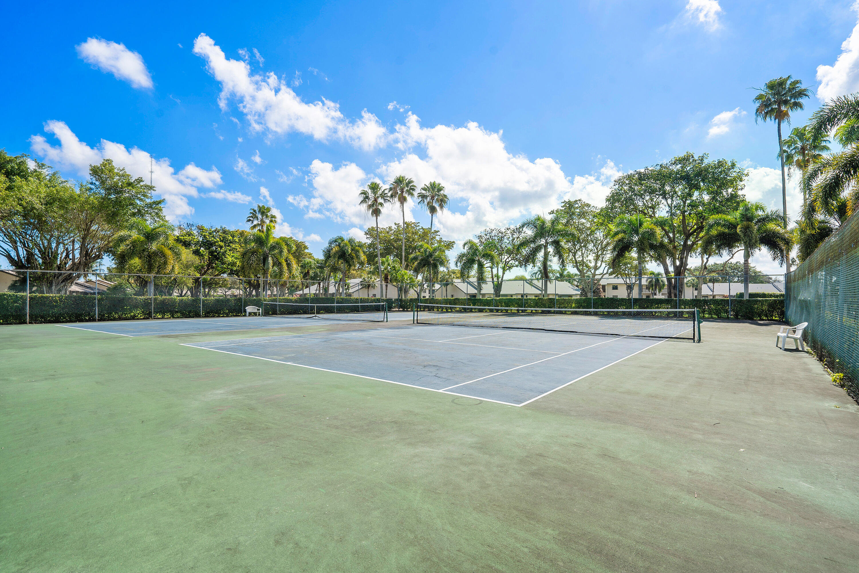 8458 Boca Glades Boulevard East Boca Raton, FL 33434 - Photo 27 of 28 a view of a tennis court