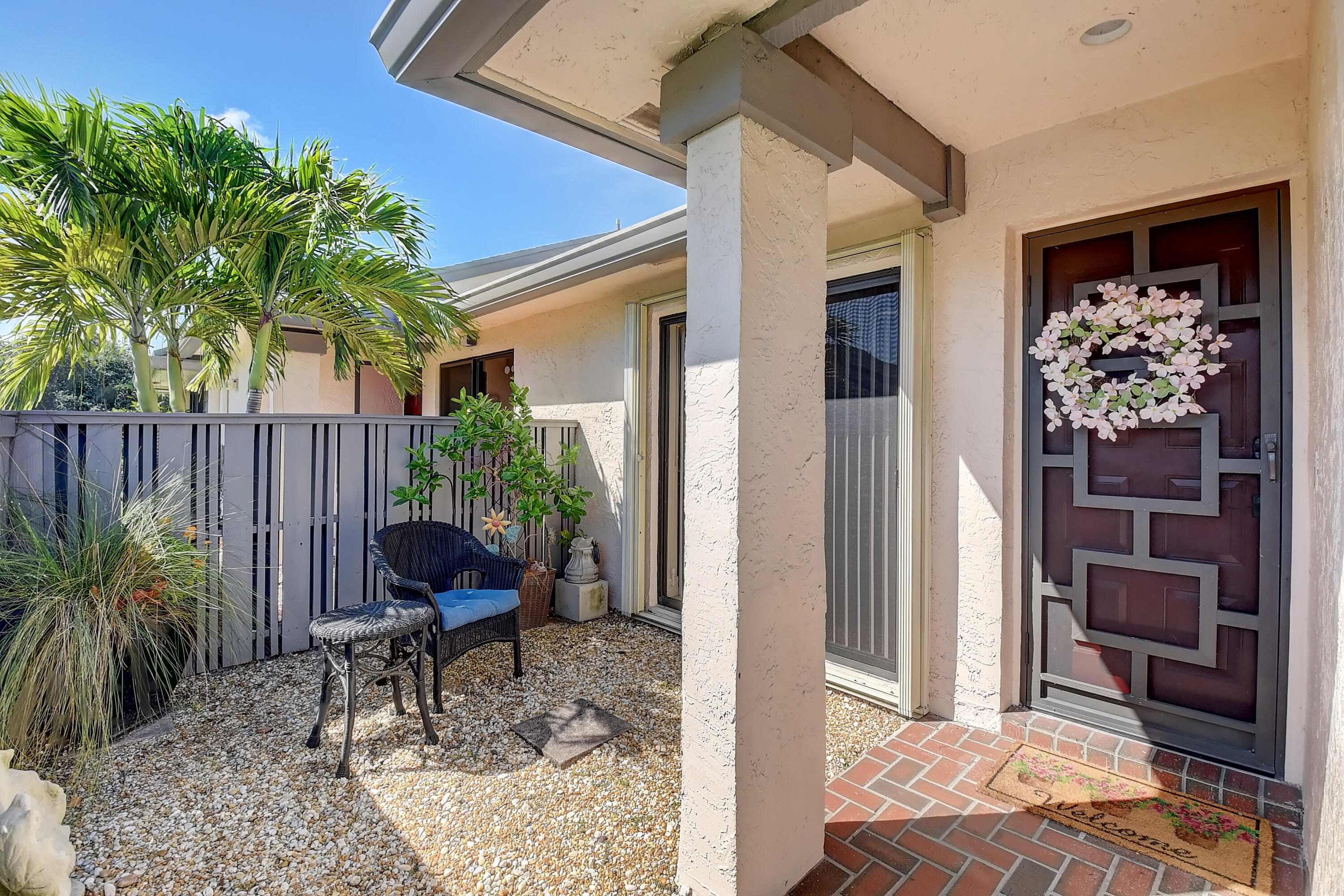 8458 Boca Glades Boulevard East Boca Raton, FL 33434 - Photo 4 of 28 a view of balcony and patio