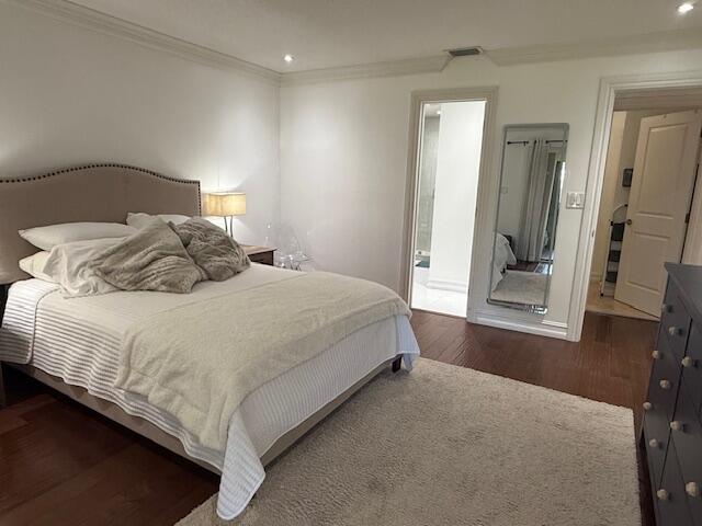 8458 Boca Glades Boulevard East Boca Raton, FL 33434 - Photo 8 of 28 a bedroom with a bed and a mirror