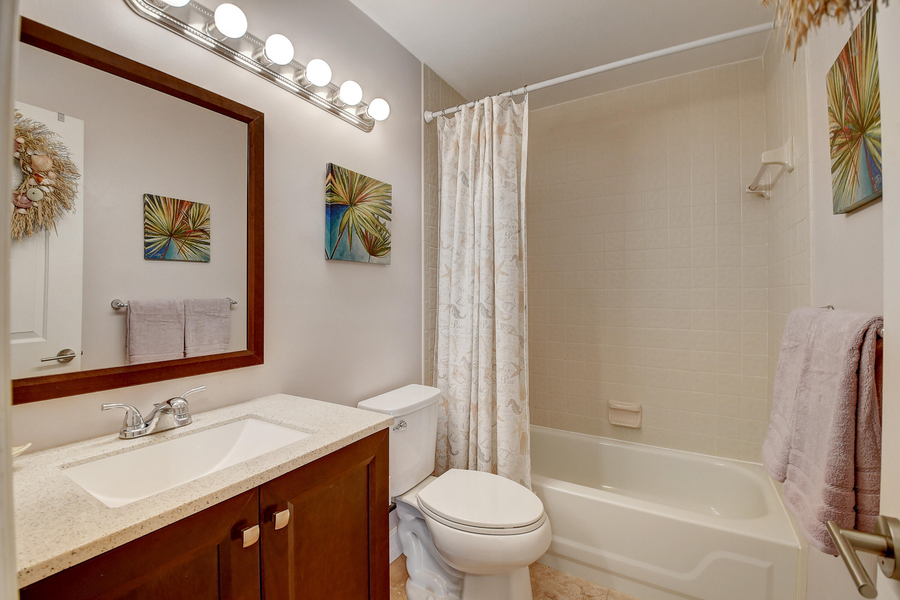 8458 Boca Glades Boulevard East Boca Raton, FL 33434 - Photo 10 of 28 a bathroom with a sink a toilet and shower