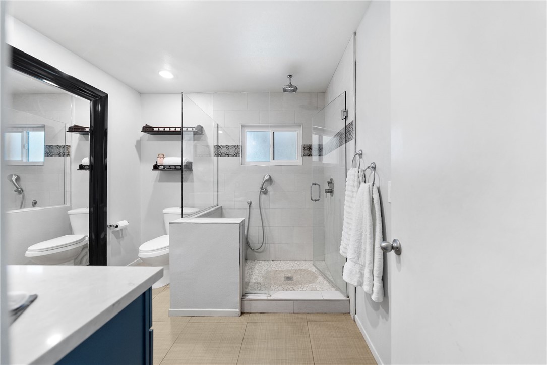 1773 Ivy Road Oceanside, CA 92054 - Photo 38 of 53 Primary bathroom with remodeled walk in shower