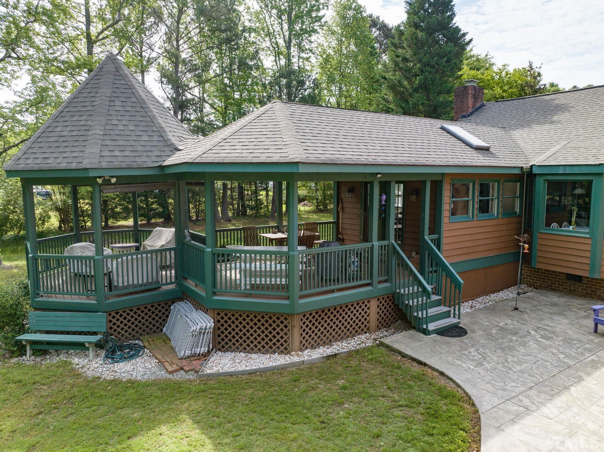 920 Wagstaff Road Fuquay-Varina, NC 27526 - Photo 50 of 58 a view of a house with backyard and sitting area