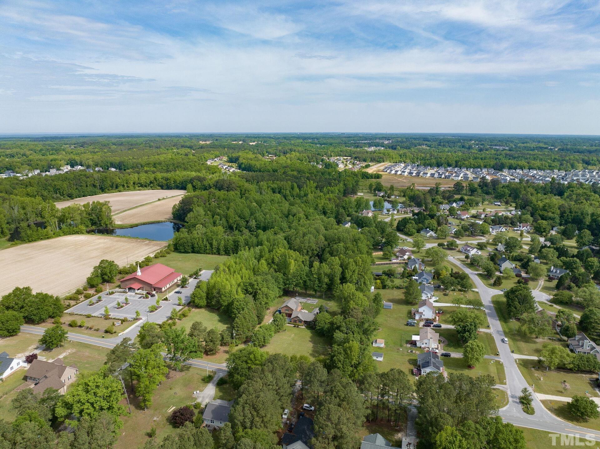 920 Wagstaff Road Fuquay-Varina, NC 27526 - Photo 56 of 58 an aerial view of a houses with city view
