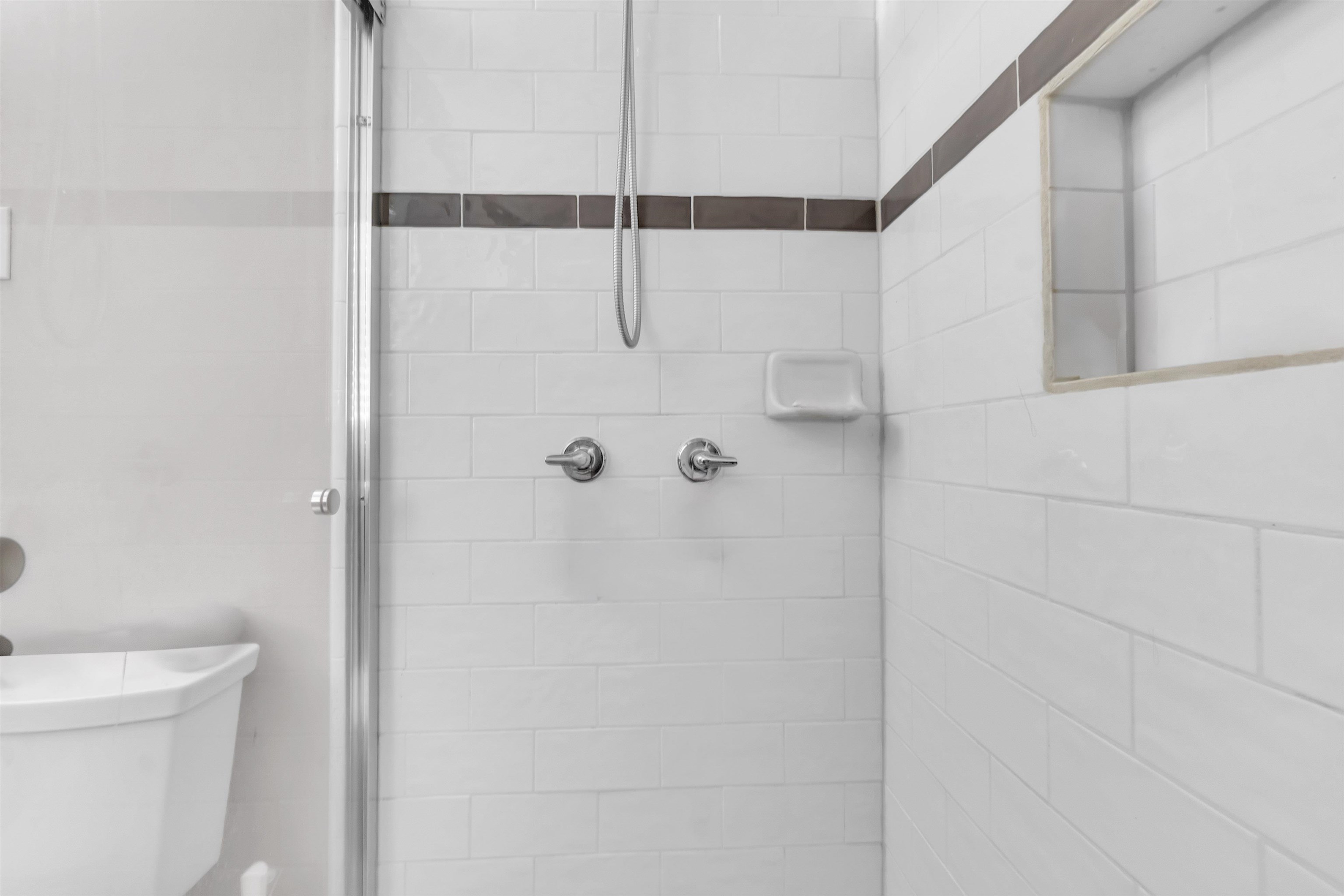 3463 Dupre Street Memphis, TN 38115 - Photo 18 of 25 Full bathroom with a shower stall and toilet