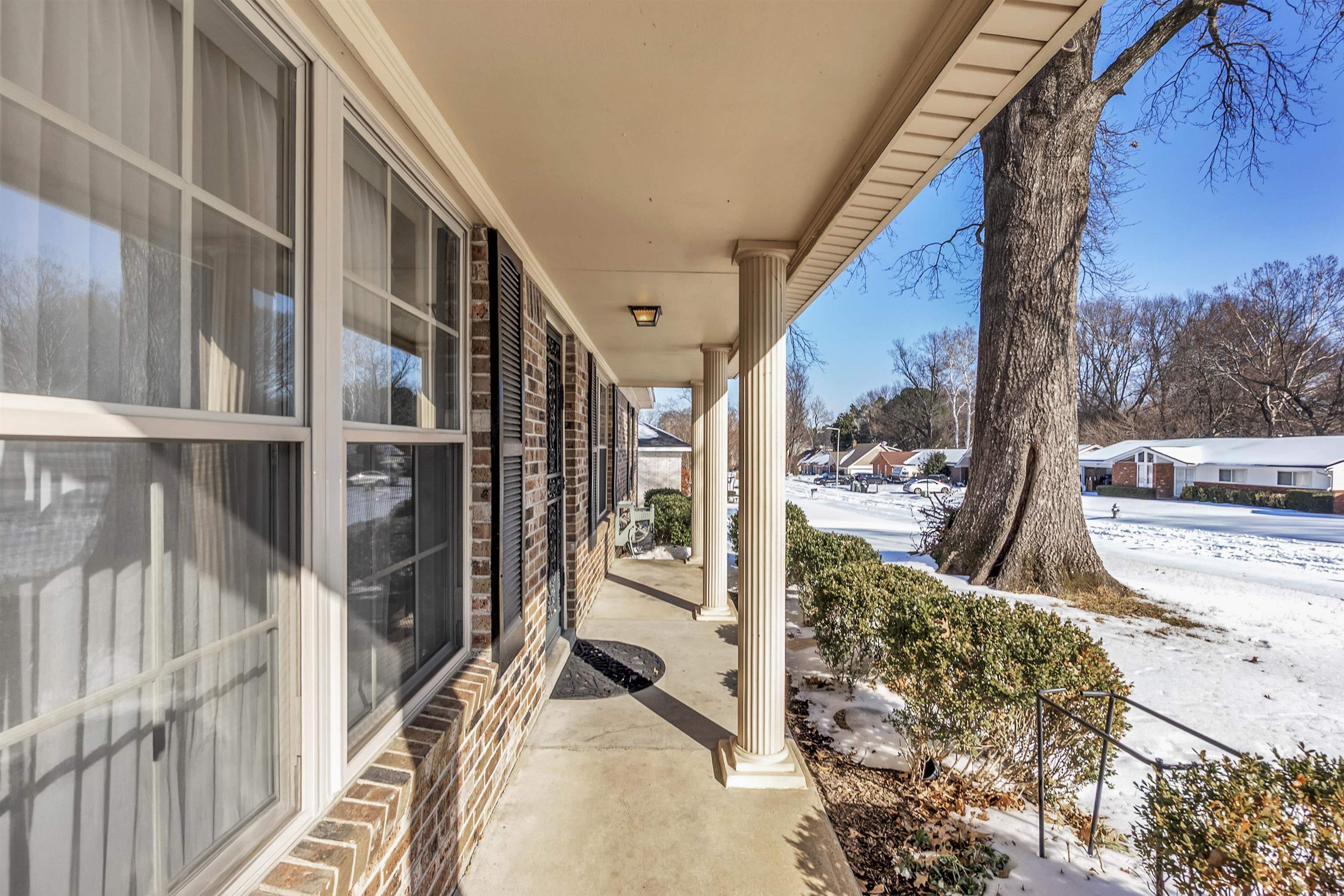 3463 Dupre Street Memphis, TN 38115 - Photo 4 of 25 Snow covered patio with covered porch