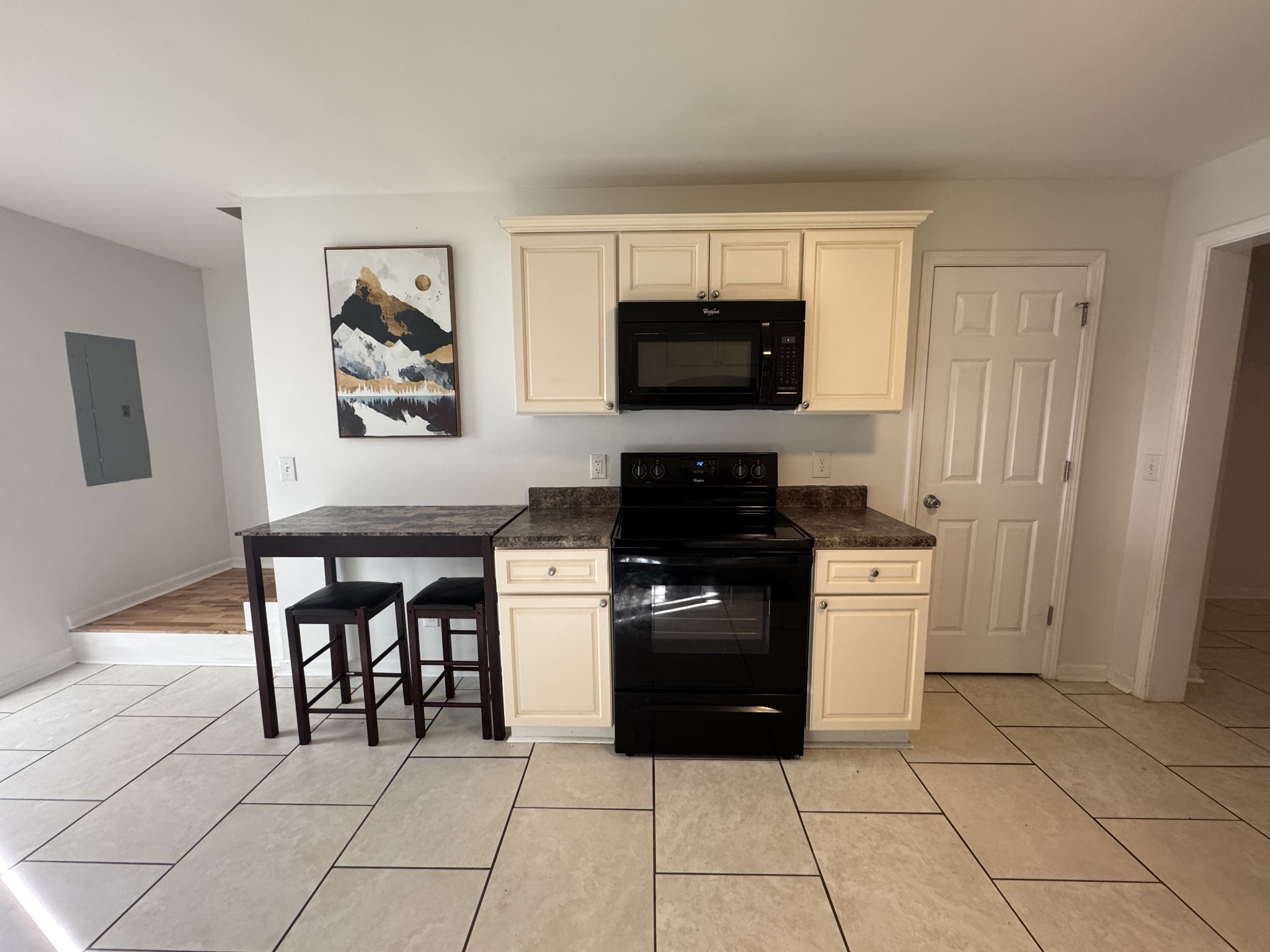 531 Dill Lane, Unit A9 Murfreesboro, TN 37130 - Photo 17 of 24 a kitchen with stainless steel appliances a stove top oven a sink a counter top space and cabinets