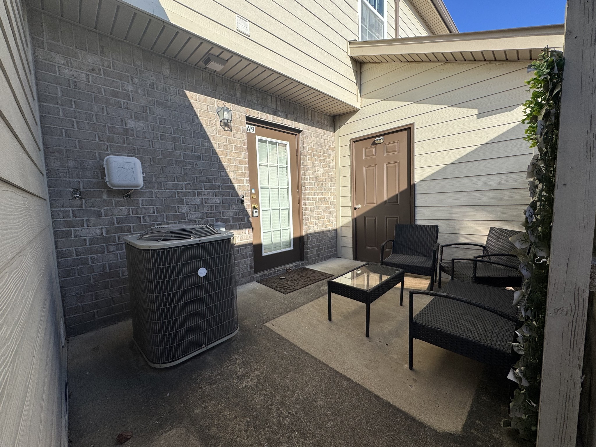 531 Dill Lane, Unit A9 Murfreesboro, TN 37130 - Photo 24 of 24 a building outdoor space with patio furniture