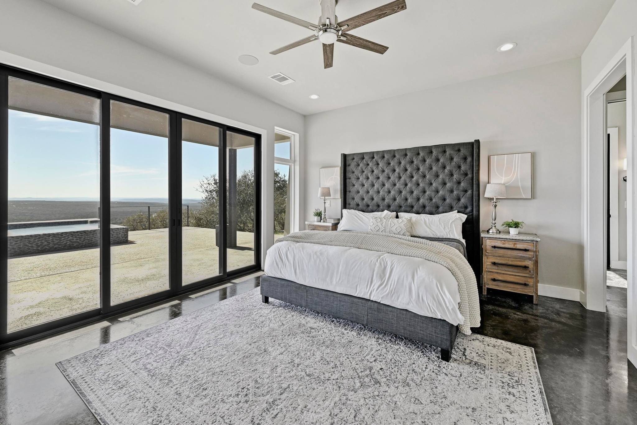 220 Eagle Ridge Burnet, TX 78611 - Photo 18 of 40 The private primary suite offers serene lake views and exceptional privacy.