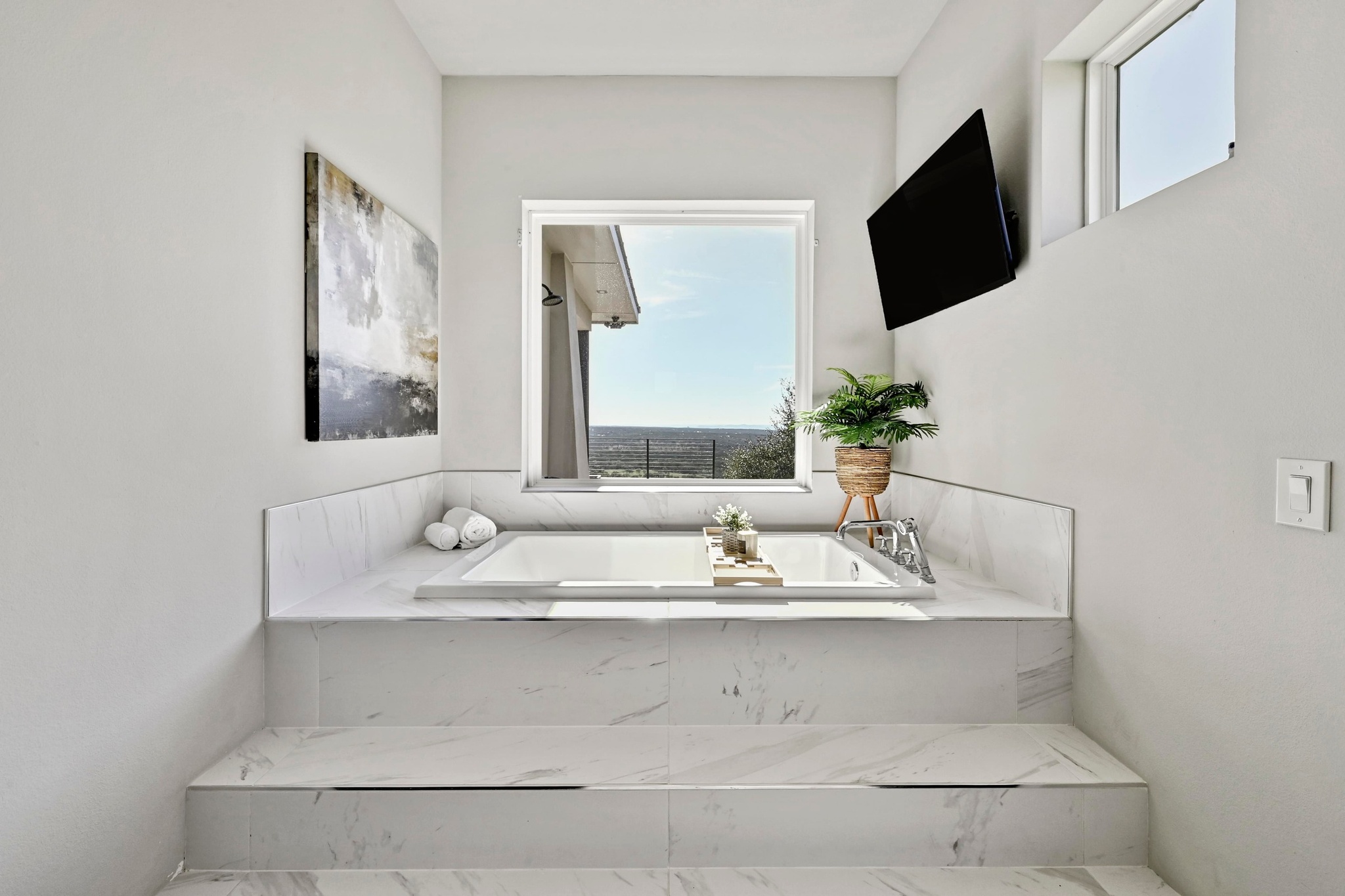 220 Eagle Ridge Burnet, TX 78611 - Photo 21 of 40 The bathroom seamlessly complements the primary suite’s refined aesthetic.