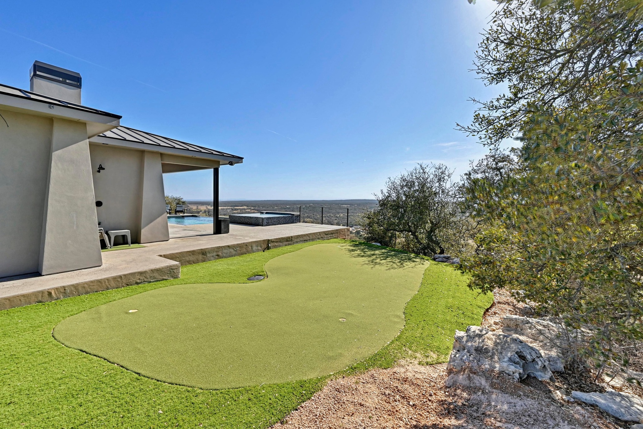 220 Eagle Ridge Burnet, TX 78611 - Photo 38 of 40 The private putting green adds a fun, resort-style feature to the property.