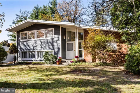 a front view of house with an outdoor space