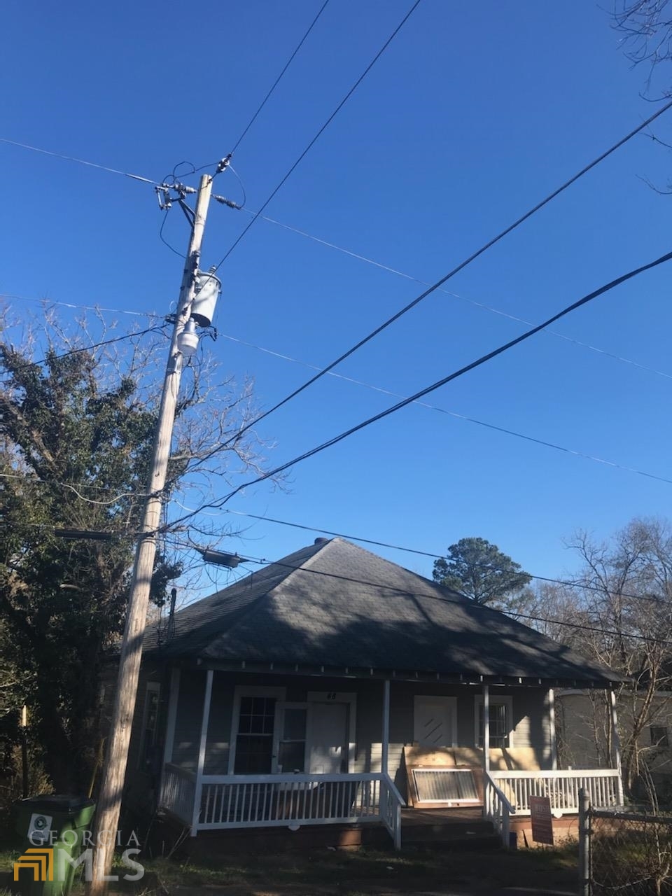 a view of a house with a street