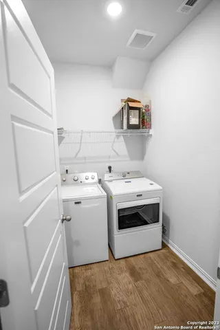 a utility room with dryer and washer