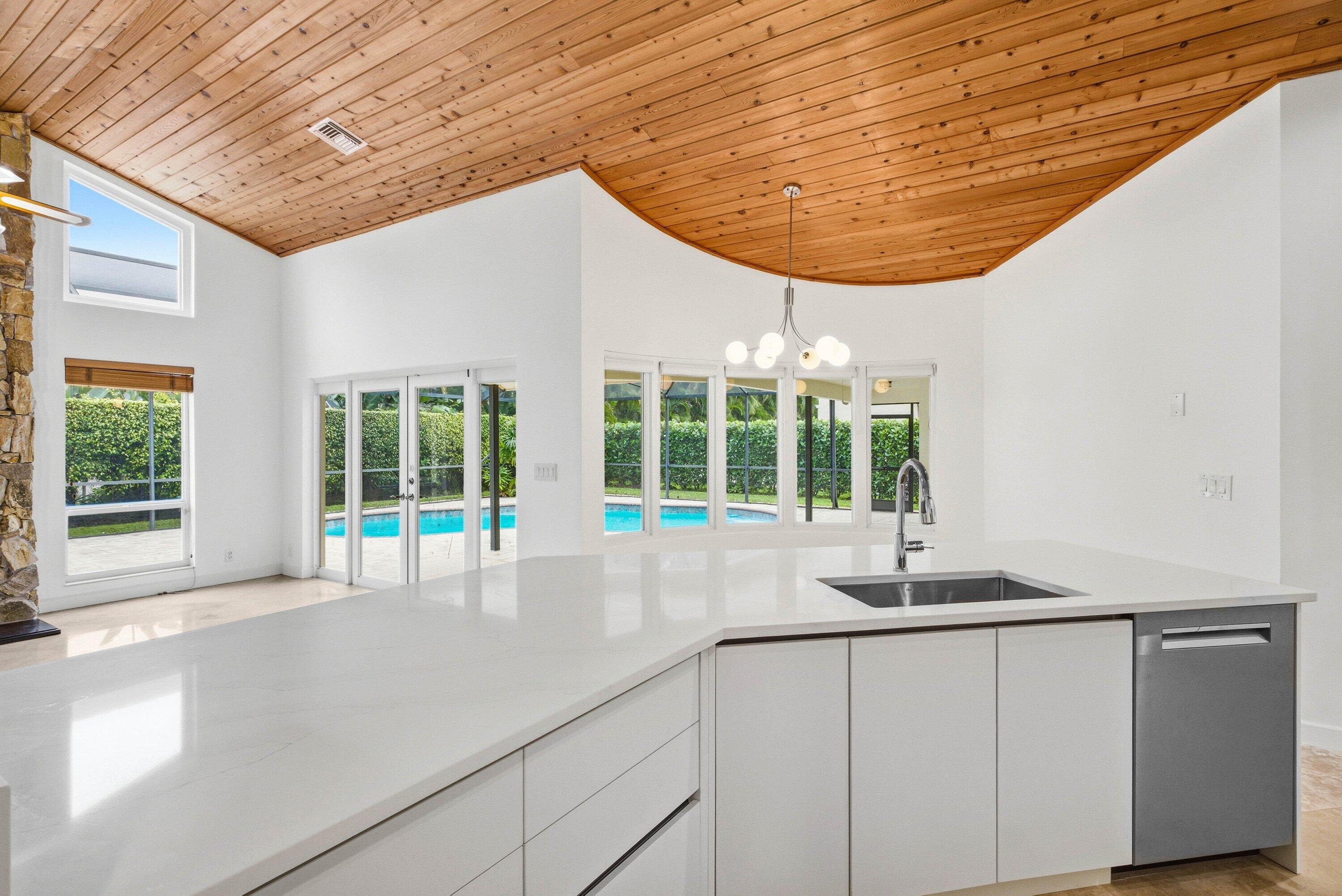 4720 Northwest 28th Avenue Boca Raton, FL 33434 - Photo 20 of 47 a view of a living room and a large window