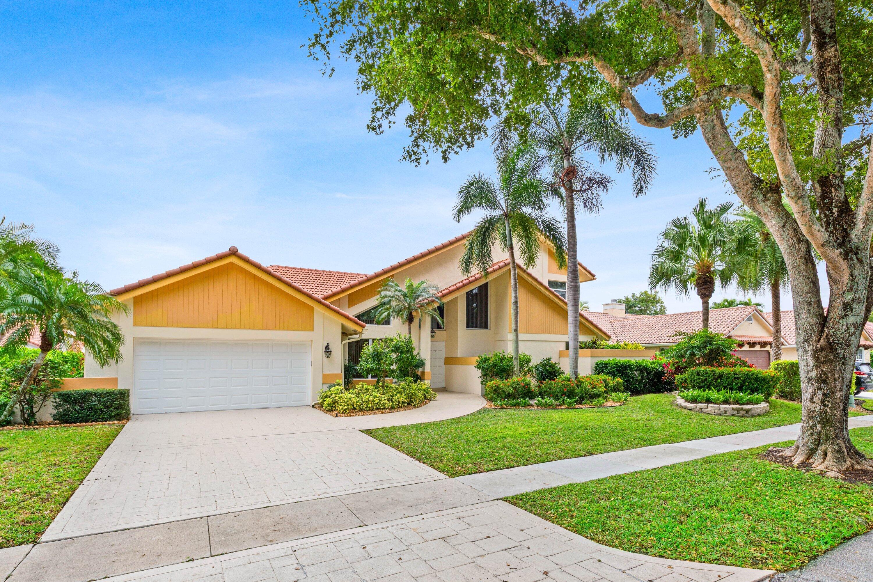 4720 Northwest 28th Avenue Boca Raton, FL 33434 - Photo 2 of 47 a view of outdoor space yard and garage