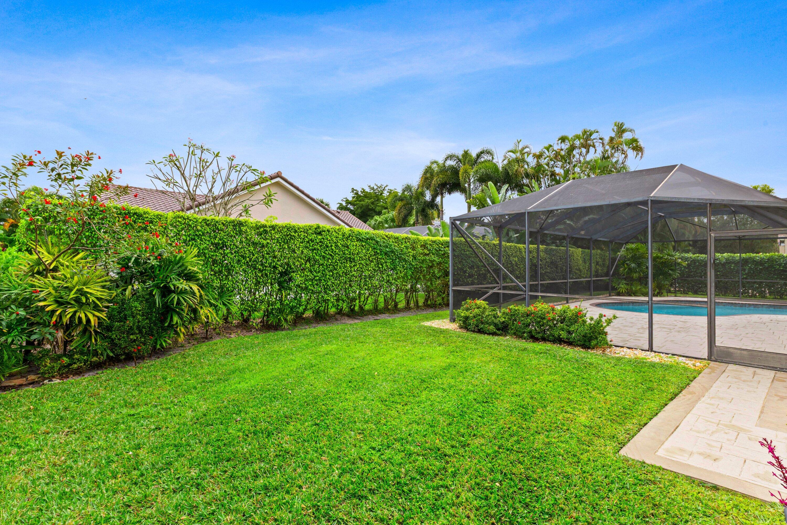 4720 Northwest 28th Avenue Boca Raton, FL 33434 - Photo 32 of 47 a view of a bedroom with a garden and plants