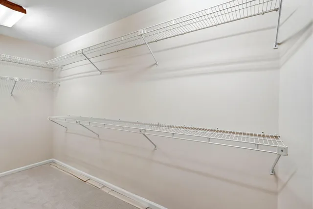 a bathroom with a tub and a shower