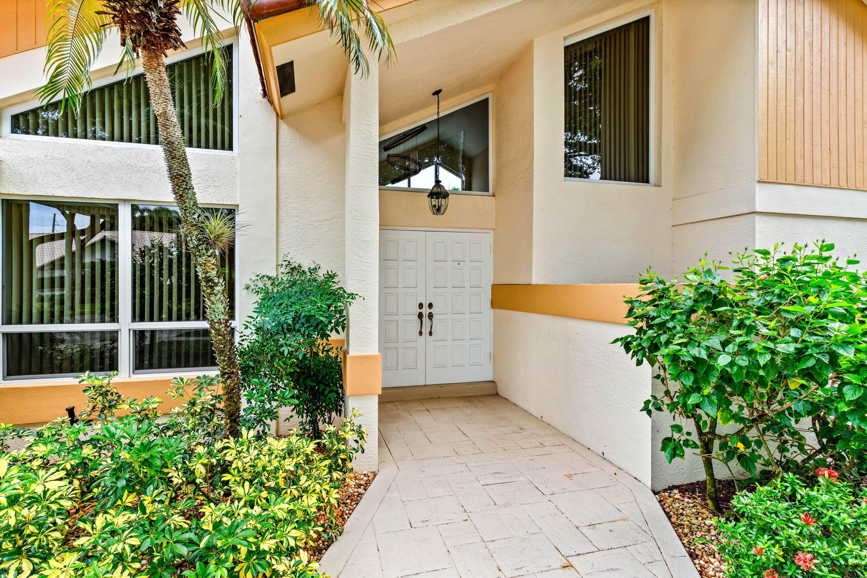 4720 Northwest 28th Avenue Boca Raton, FL 33434 - Photo 6 of 47 a house view with a outdoor space