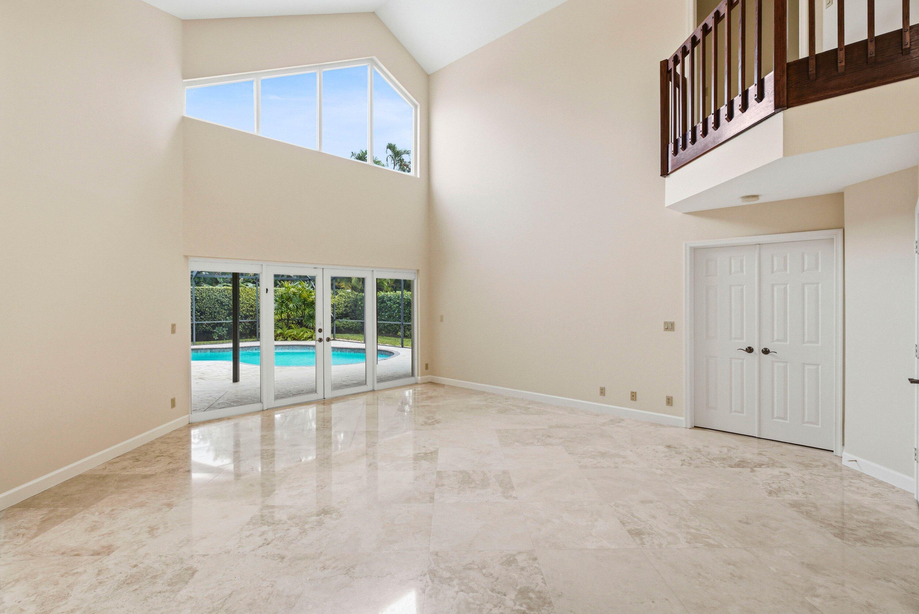4720 Northwest 28th Avenue Boca Raton, FL 33434 - Photo 10 of 47 a view of an empty room with a window