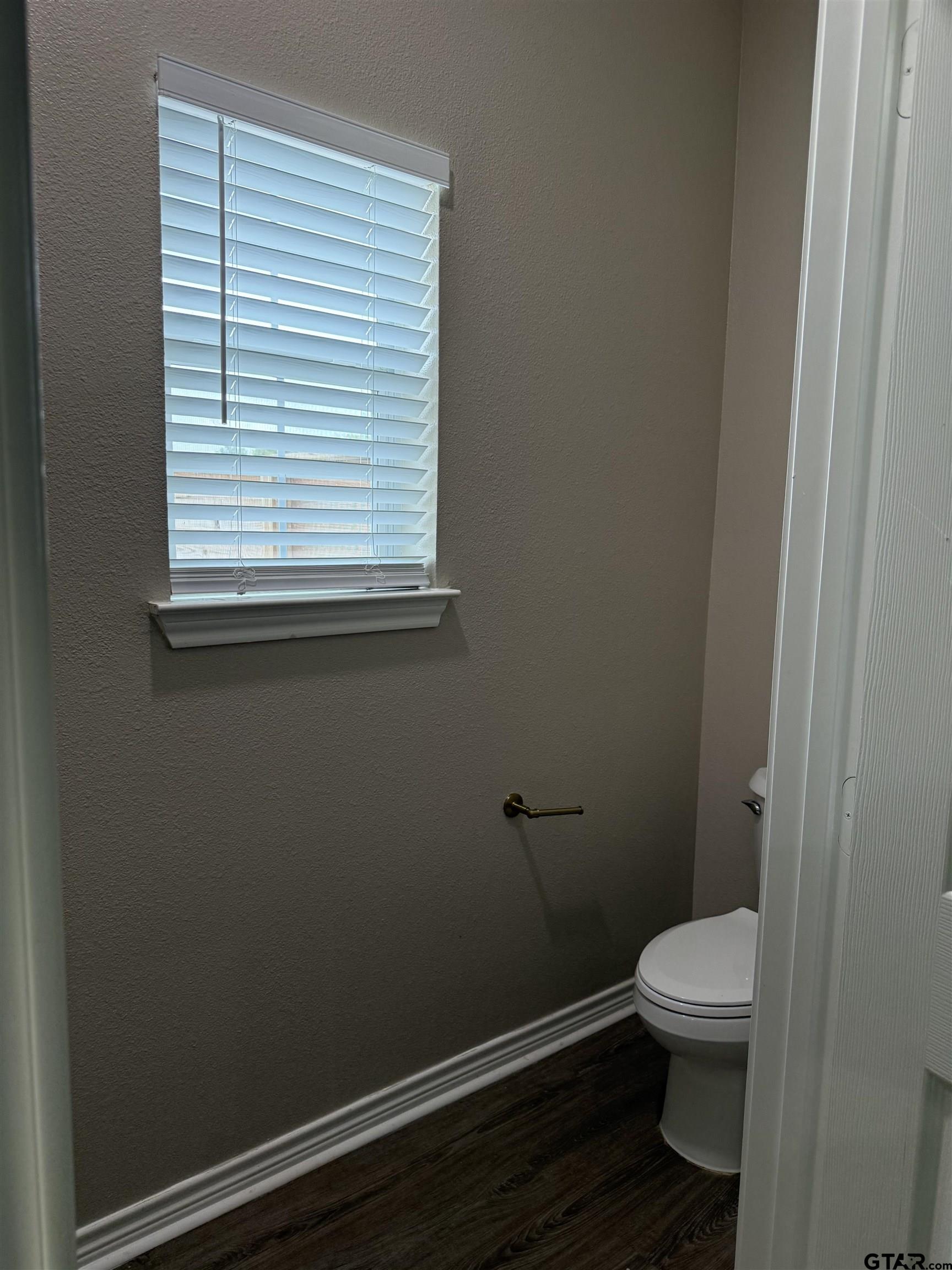 14965 Turtle Crk Rnch Road Flint, TX 75762 - Photo 23 of 26 a bathroom with a toilet