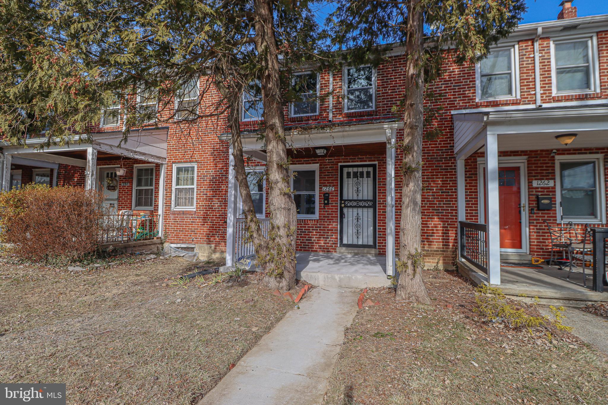 1260 Cedarcroft Road Baltimore, MD 21239 - Photo 1 of 30 a view of a house with a yard