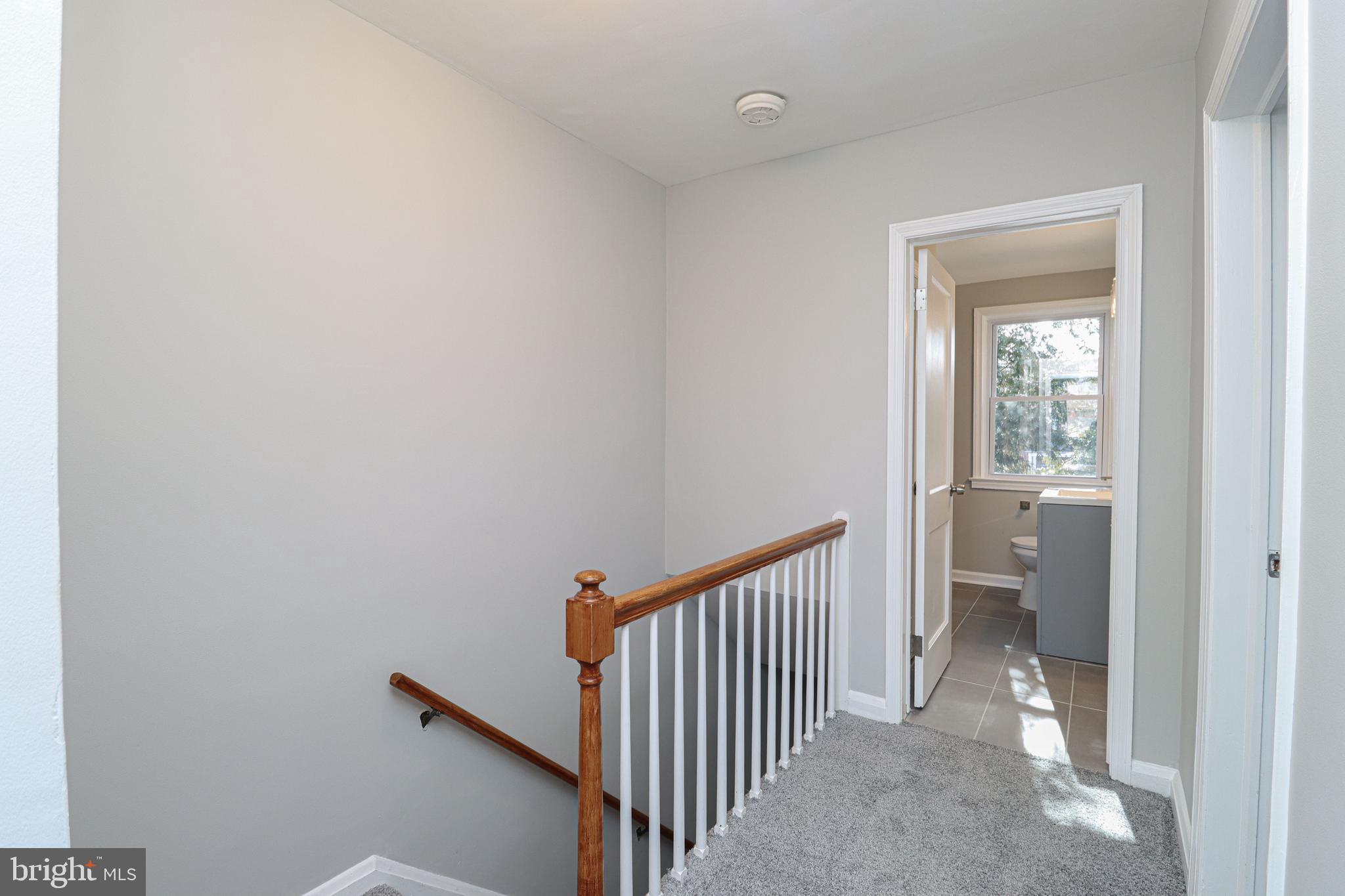 1260 Cedarcroft Road Baltimore, MD 21239 - Photo 14 of 30 a view of a hallway