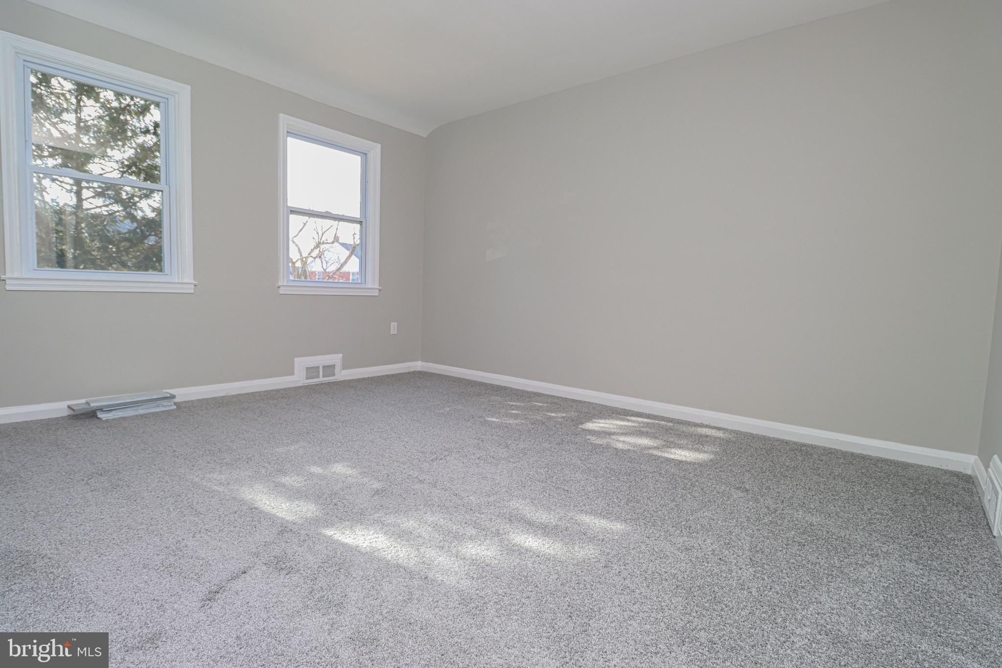 1260 Cedarcroft Road Baltimore, MD 21239 - Photo 18 of 30 an empty room with windows
