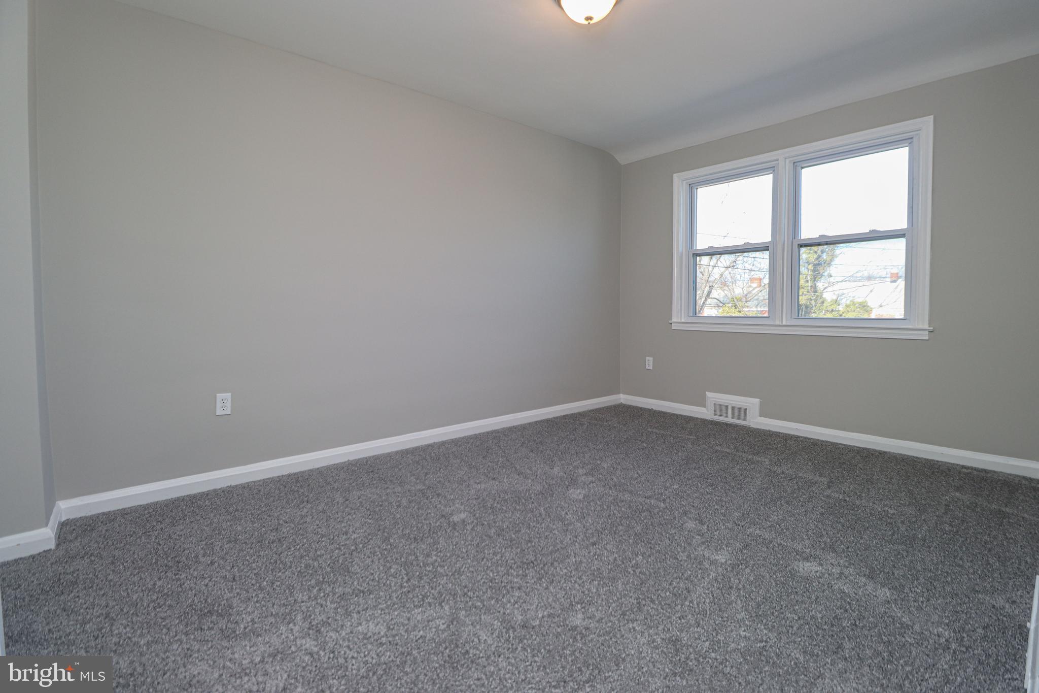 1260 Cedarcroft Road Baltimore, MD 21239 - Photo 20 of 30 an empty room with a window