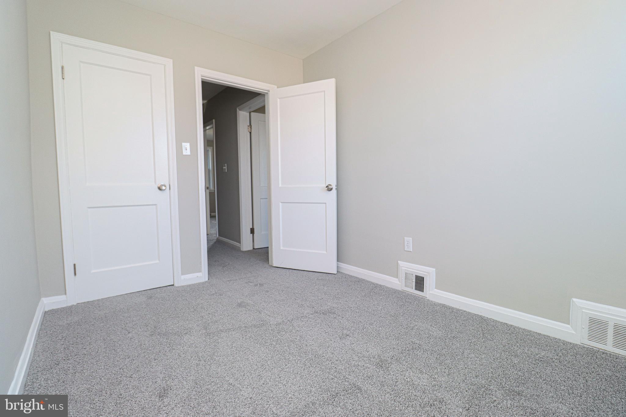 1260 Cedarcroft Road Baltimore, MD 21239 - Photo 24 of 30 a view of an empty room and closet area