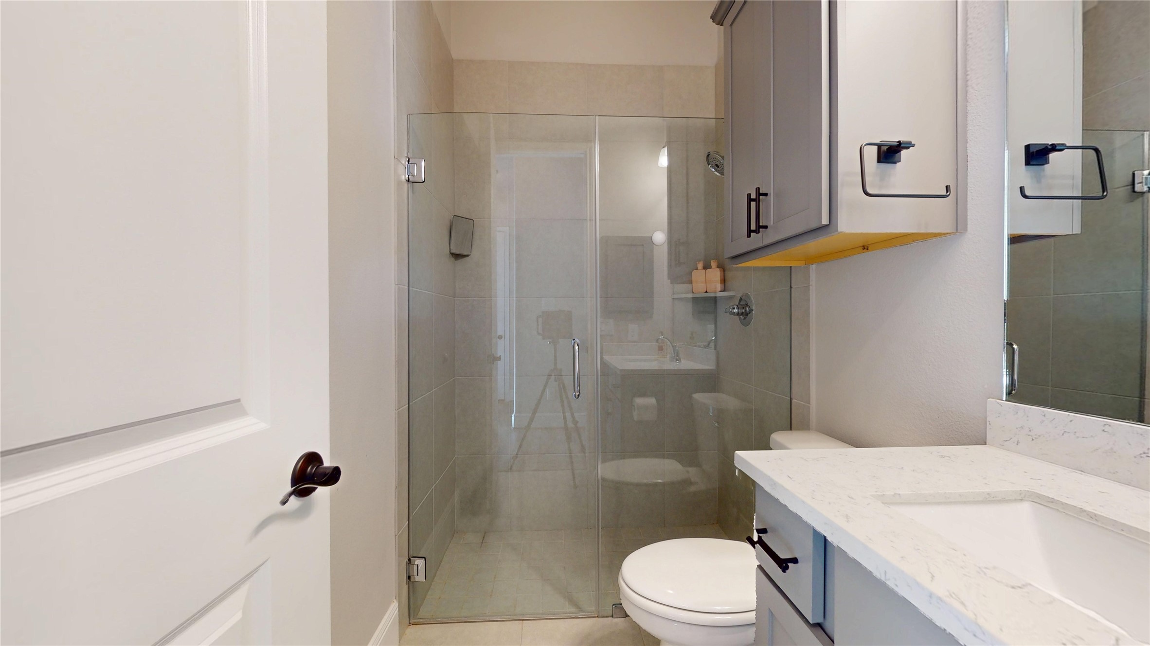 8305 Greenleaf Ridge Way Conroe, TX 77385 - Photo 20 of 33 a bathroom with a sink a toilet and shower