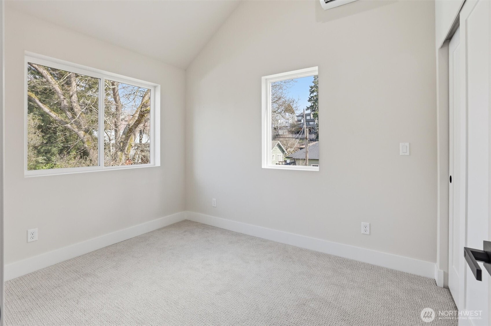 3324 35th Avenue South, Unit A Seattle, WA 98144 - Photo 12 of 20 an empty room with windows and a window