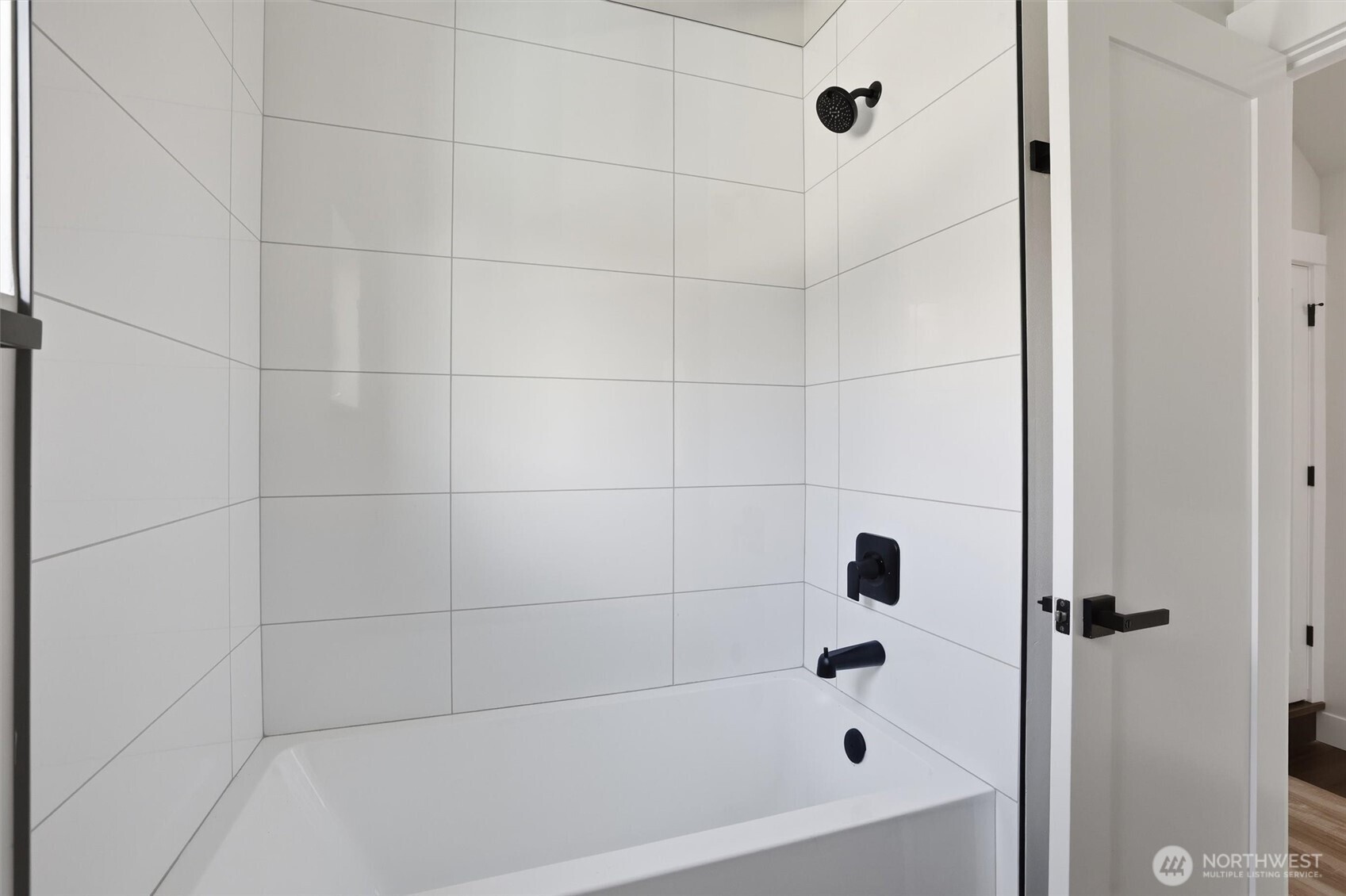 3324 35th Avenue South, Unit A Seattle, WA 98144 - Photo 15 of 20 a bathroom with a bathtub