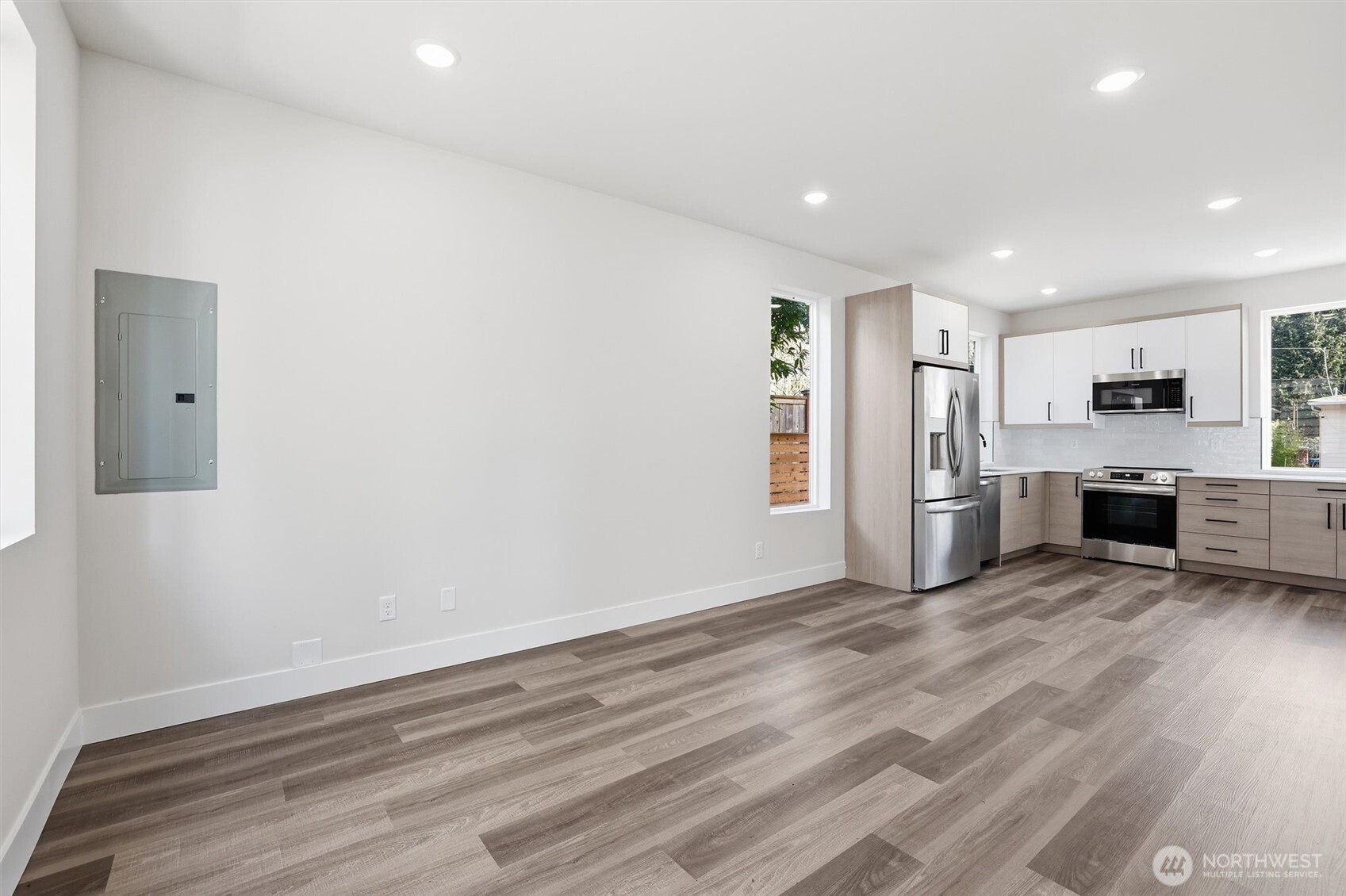 3324 35th Avenue South, Unit A Seattle, WA 98144 - Photo 3 of 20 a view of kitchen with granite countertop cabinets and refrigerator