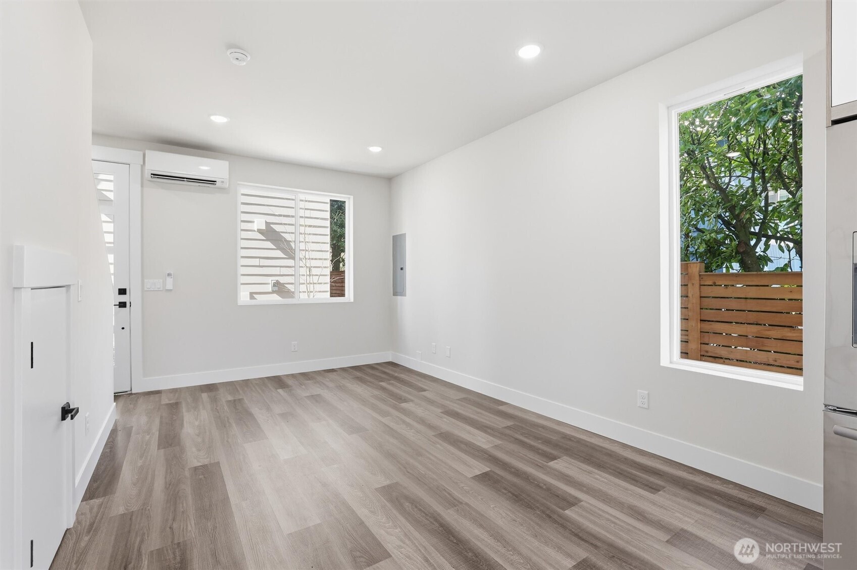 3324 35th Avenue South, Unit A Seattle, WA 98144 - Photo 5 of 20 a view of an empty room and a window