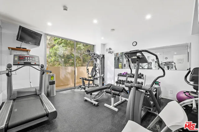 a view of a room with gym equipment