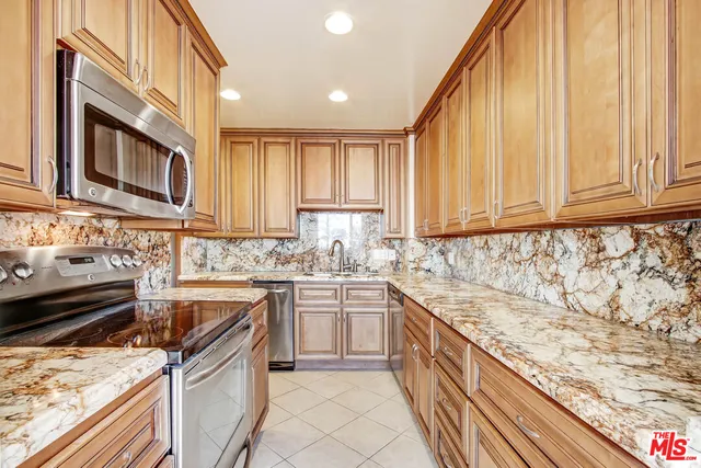 a view of a living room with wooden floor